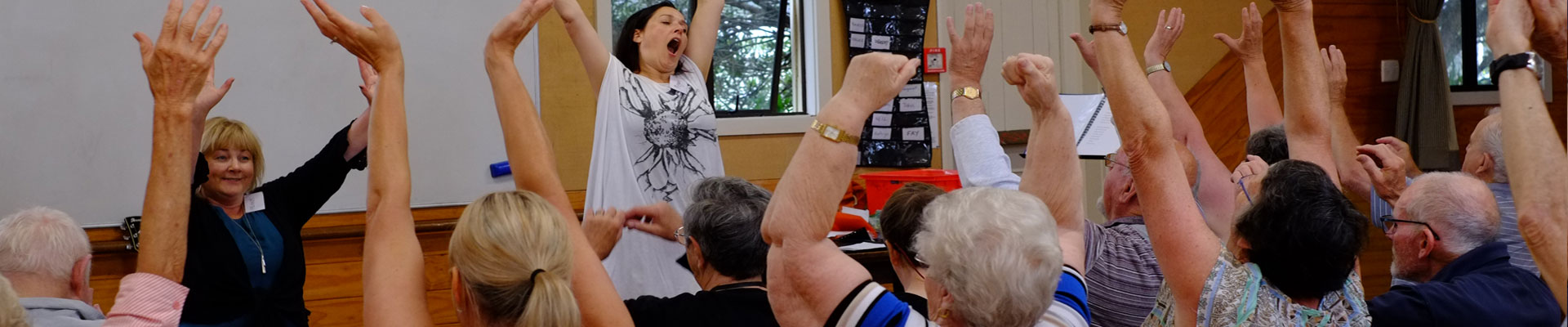 A group of singers enjoying a music therapy session